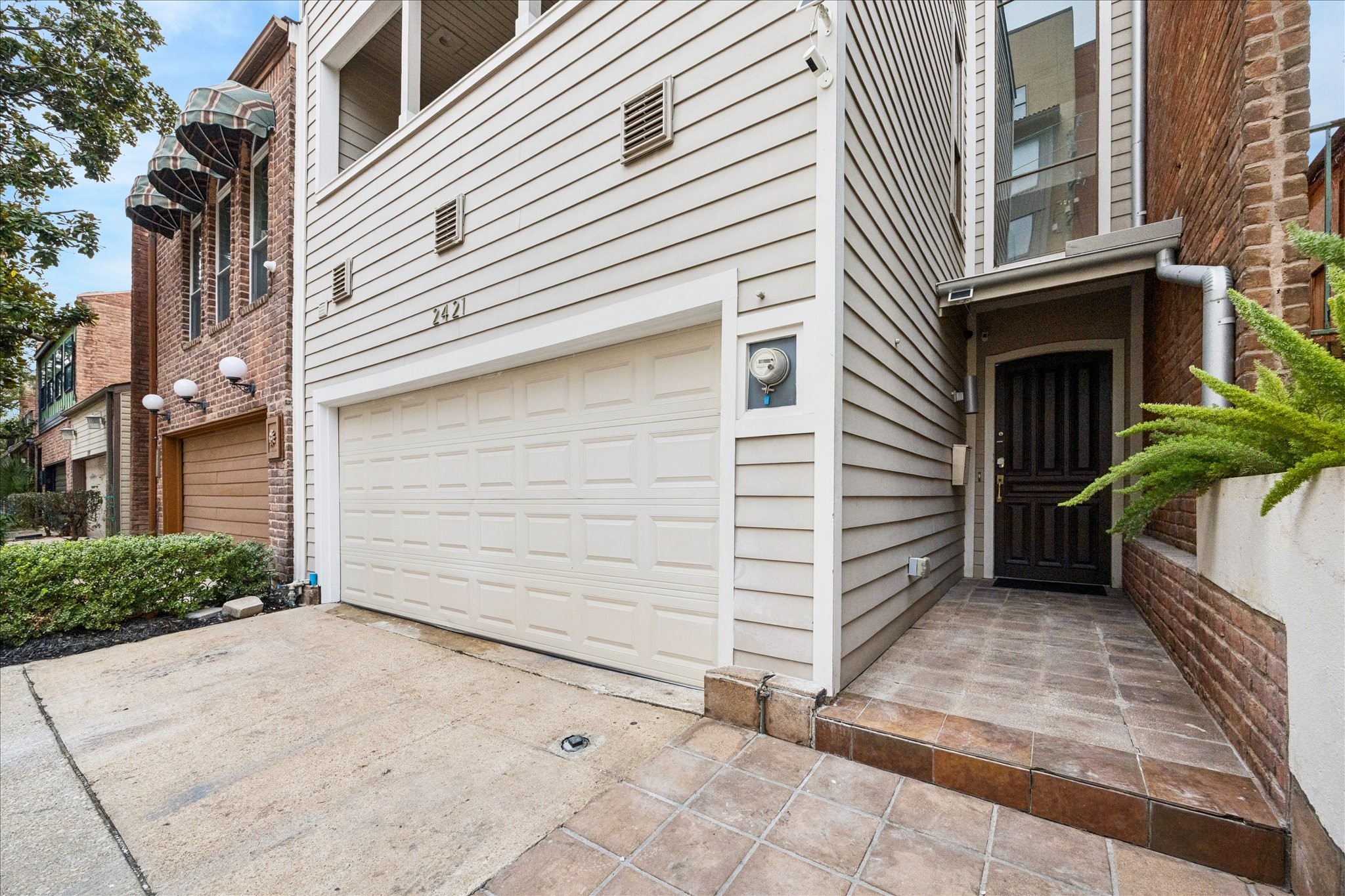 2421 Branard Street Houston, TX 77098 - Photo 28 of 28 a view of a house with garage and backyard