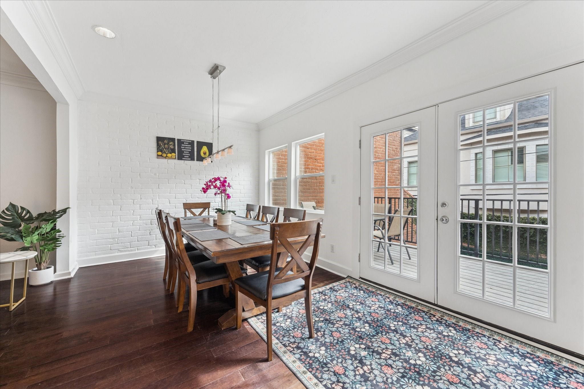 2421 Branard Street Houston, TX 77098 - Photo 9 of 28 a view of a dining room with furniture window and wooden floor