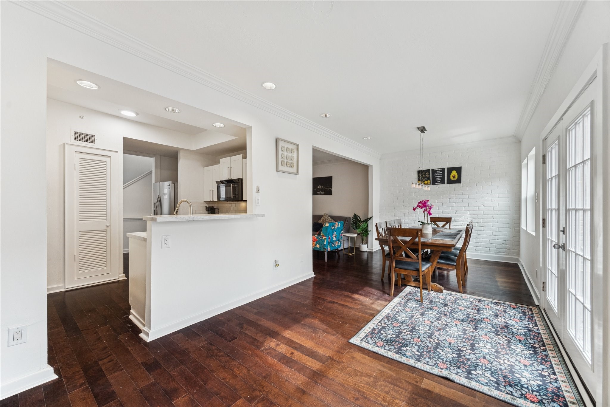 2421 Branard Street Houston, TX 77098 - Photo 10 of 28 a view of kitchen with furniture and wooden floor