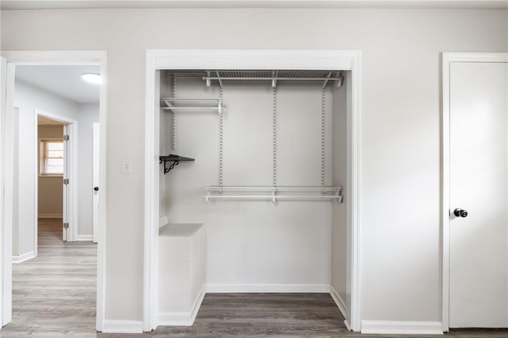 4611 Old Westside Road Austell, GA 30106 - Photo 22 of 37 a view of walk in closet with empty racks