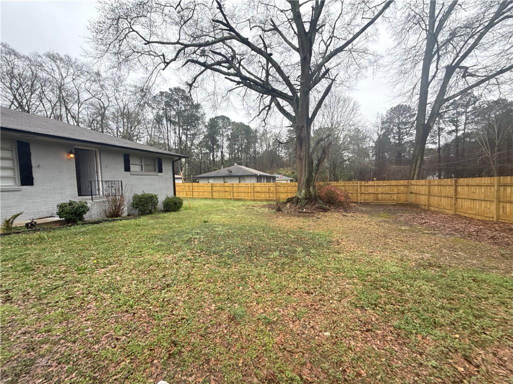 4611 Old Westside Road Austell, GA 30106 - Photo 3 of 37 a view of a house with a yard and tree s