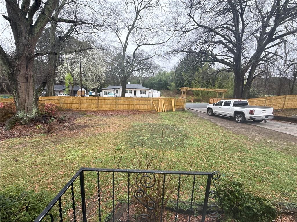 4611 Old Westside Road Austell, GA 30106 - Photo 5 of 37 a view of a street with cars parked on the road