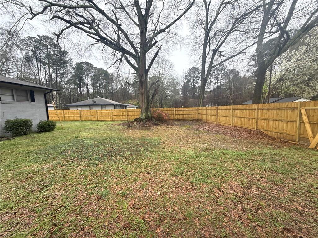 4611 Old Westside Road Austell, GA 30106 - Photo 6 of 37 a view of backyard with swimming pool