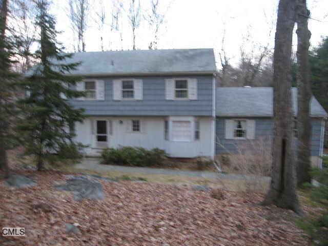 37 Rock Rimmon Drive Stamford, CT 06903 - Photo 1 of 1 a front view of a house with a yard