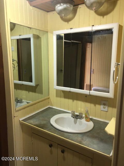 6 D Trail Brick, NJ 08724 - Photo 19 of 31 a bathroom with a sink and a mirror