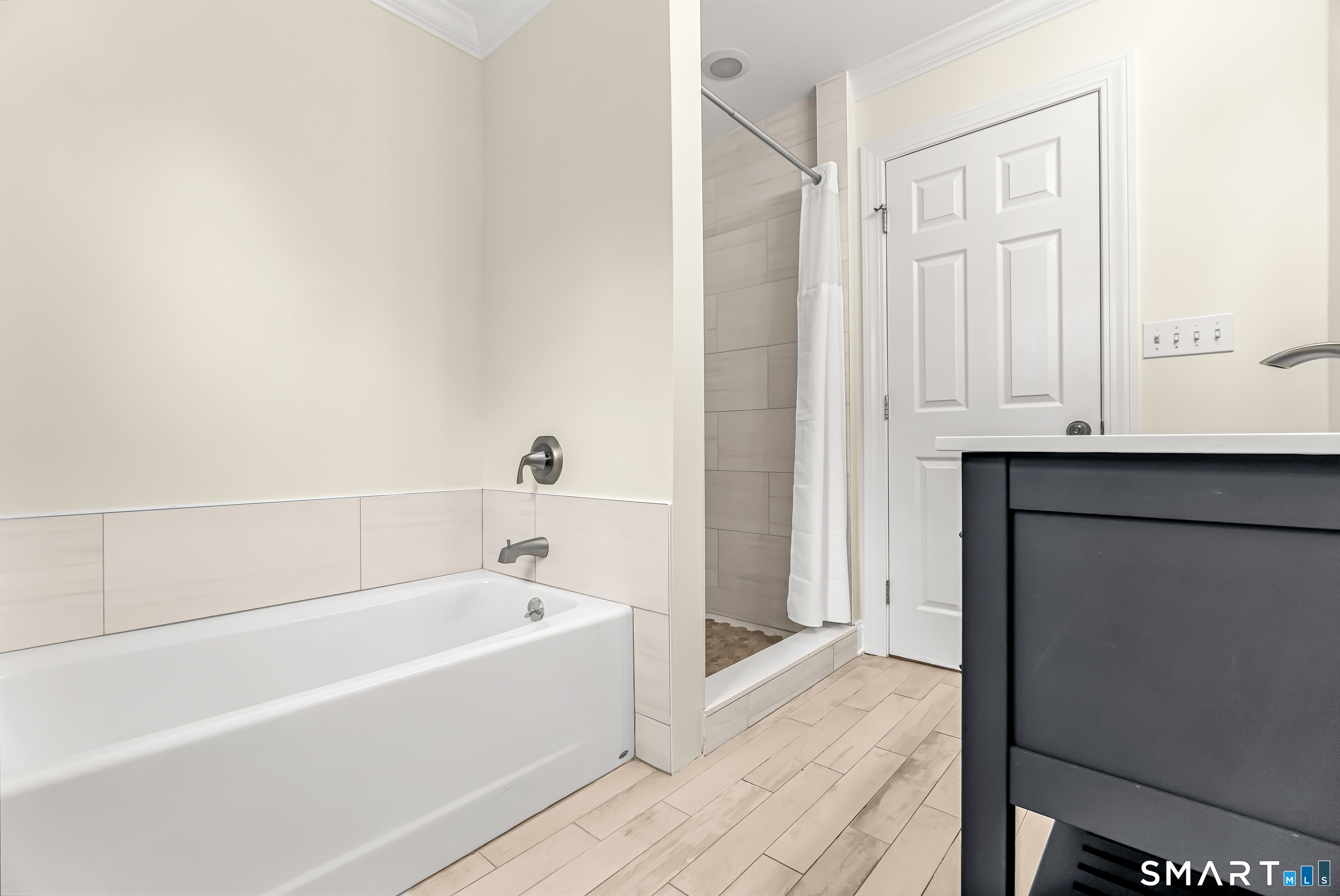 15 Bruns Road Ansonia, CT 06401 - Photo 12 of 39 a white bath tub sitting next to a shower