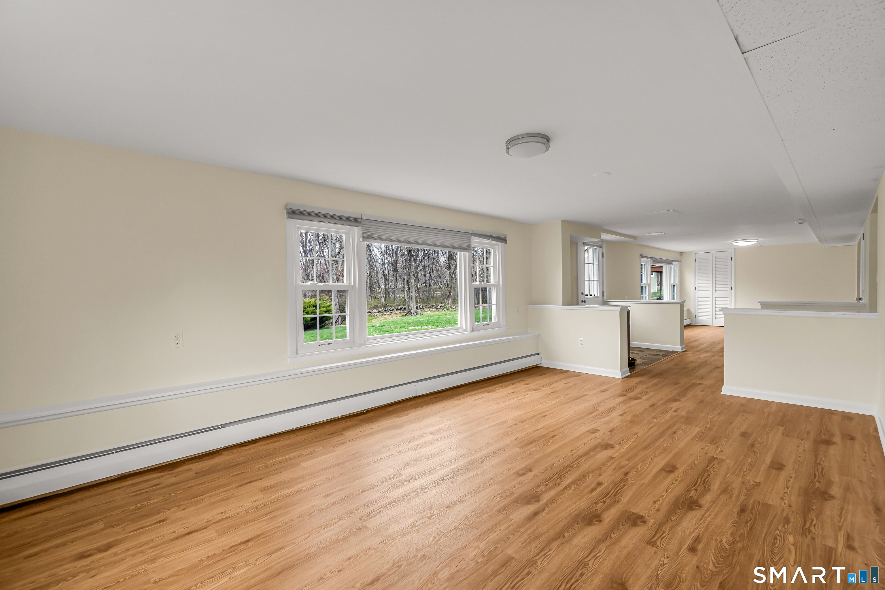 15 Bruns Road Ansonia, CT 06401 - Photo 23 of 39 a view of empty room with wooden floor and window
