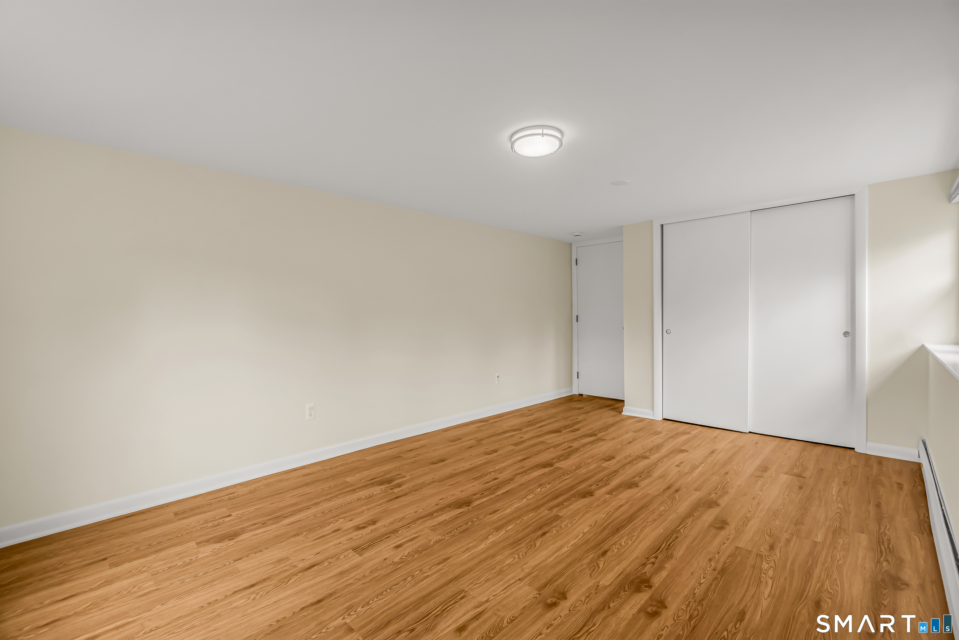 15 Bruns Road Ansonia, CT 06401 - Photo 25 of 39 a view of empty room with wooden floor