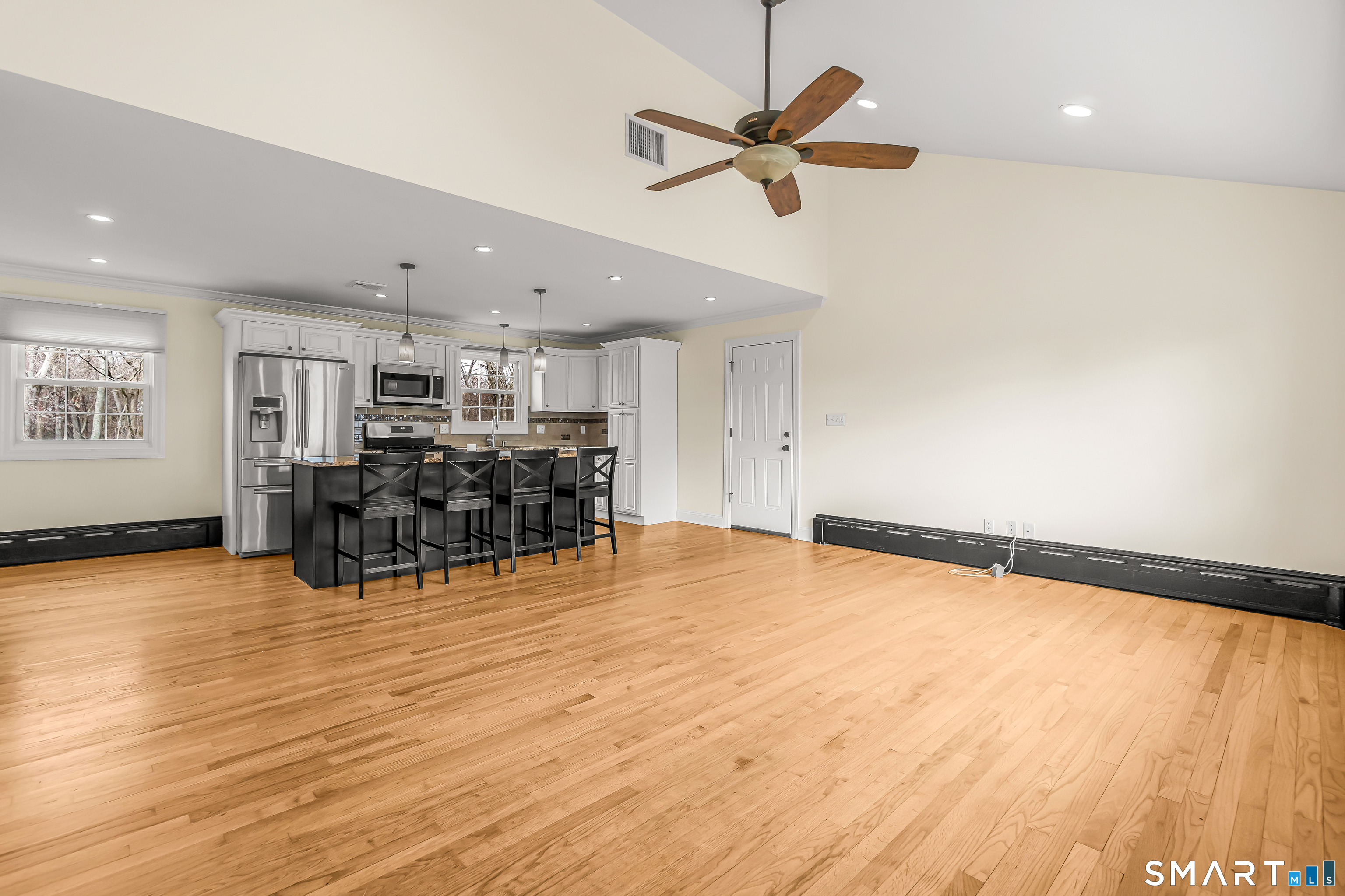 15 Bruns Road Ansonia, CT 06401 - Photo 3 of 39 a view of a room with wooden floor and furniture