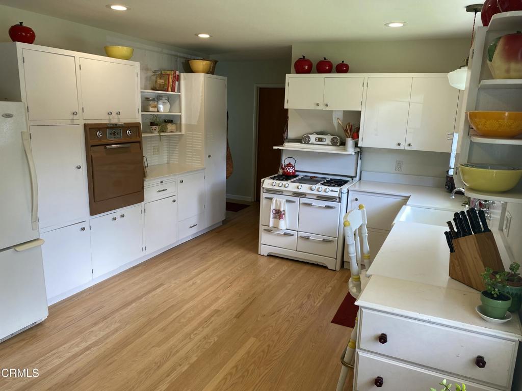 31400 Sherwood Road Fort Bragg, CA 95437 - Photo 17 of 55 a kitchen with stainless steel appliances a stove a refrigerator and a refrigerator