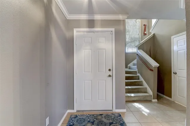 a view of entryway with stairs