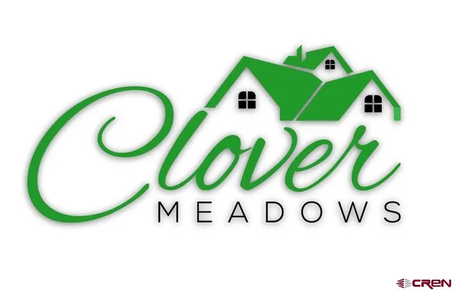 a view of sign board with a play wall and a window