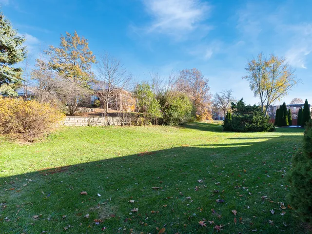 a view of a golf course with a lake