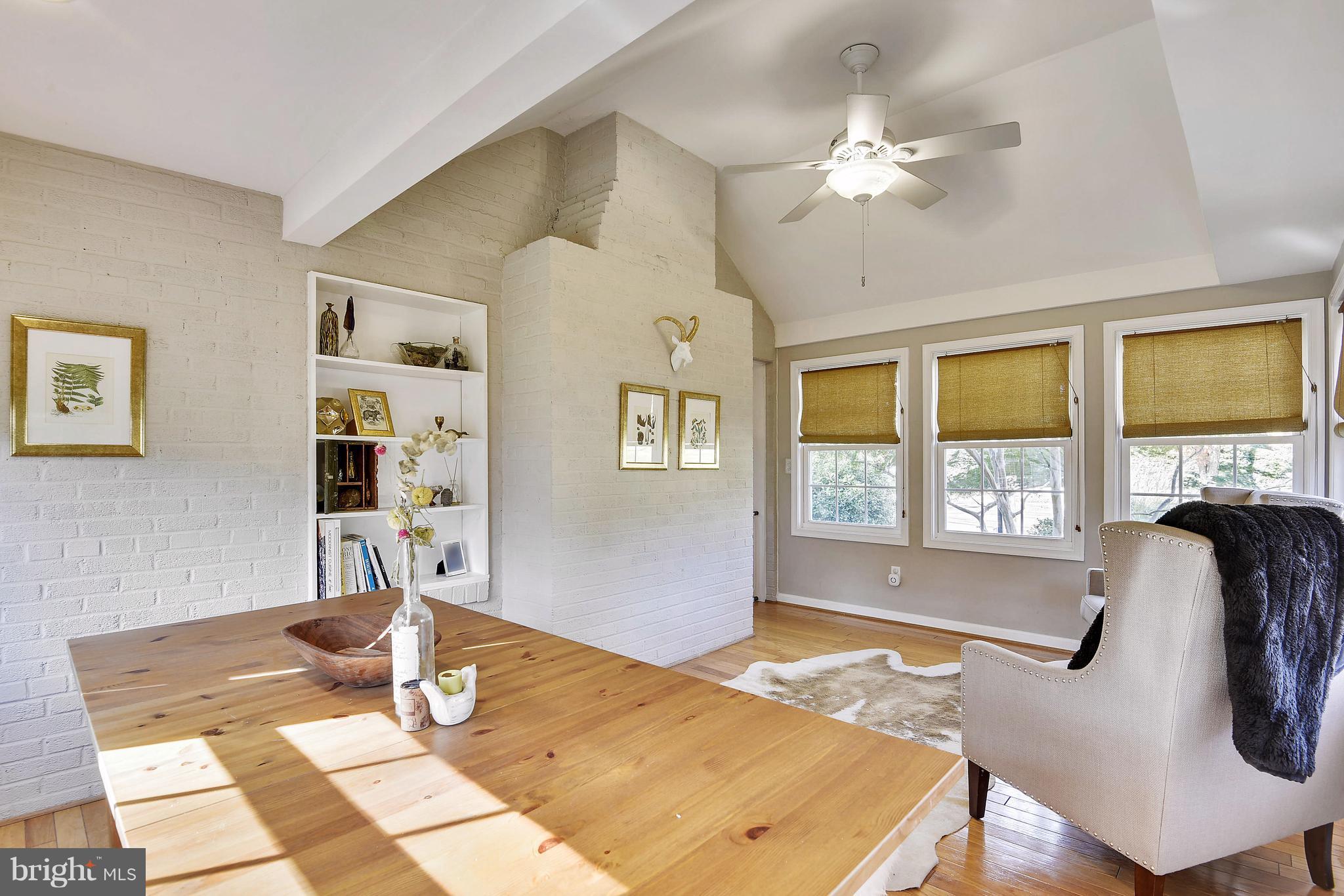 624 Wayne Avenue Silver Spring, MD 20910 - Photo 12 of 28 a living room with table and window