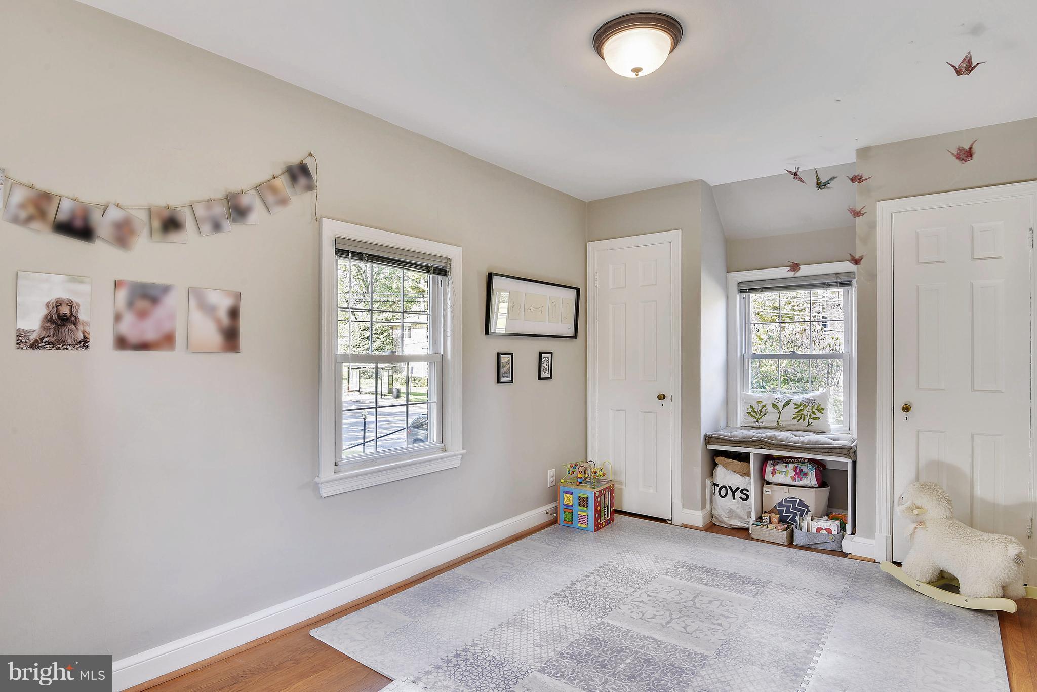 624 Wayne Avenue Silver Spring, MD 20910 - Photo 19 of 28 a view of livingroom with furniture and windows