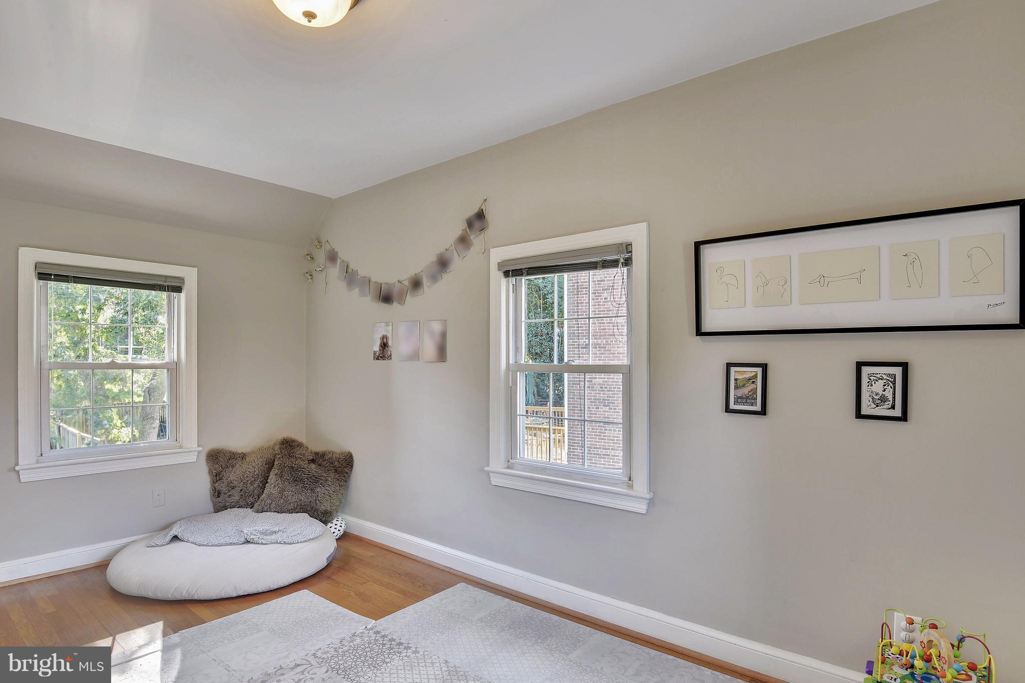 624 Wayne Avenue Silver Spring, MD 20910 - Photo 20 of 28 a living room with furniture and a window