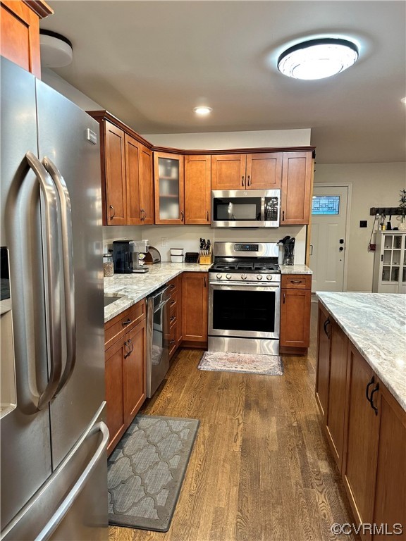 7379 Venable Road Kents Store, VA 23084 - Photo 11 of 28 a kitchen with stainless steel appliances granite countertop a stove top oven a sink and a refrigerator