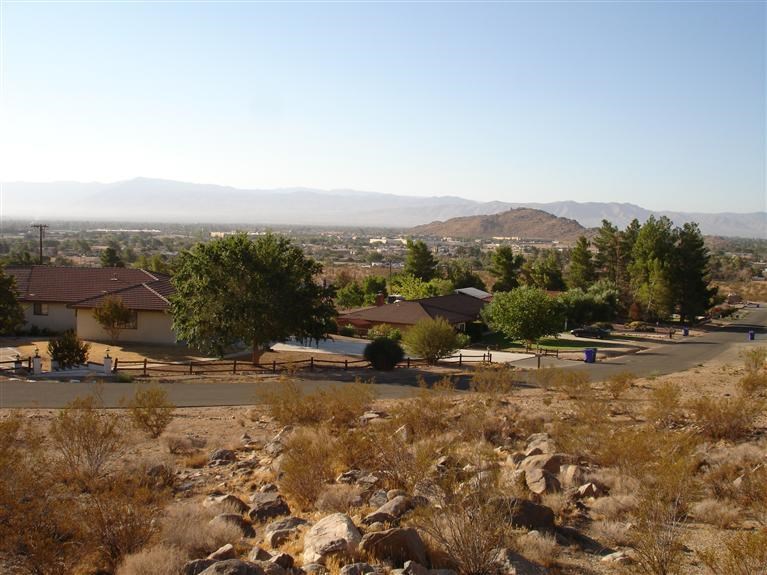 0 Catawba Road Apple Valley, CA 92307 - Photo 1 of 1 a view of a town with mountains in the background