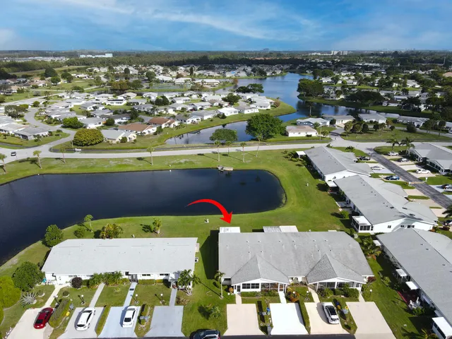 an aerial view of residential houses and city view