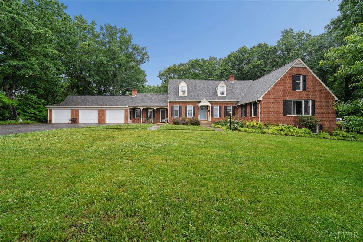 3289 Peaks Road Bedford, VA 24523 - Photo 1 of 71 a view of a house with a big yard and large trees