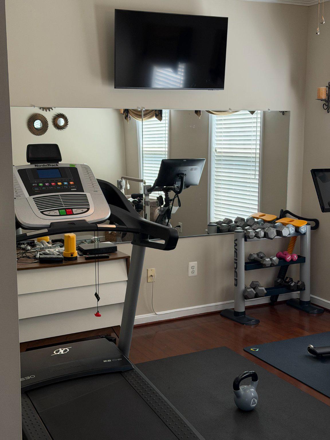 14108 Jones Bridge Road Upper Marlboro, MD 20774 - Photo 20 of 36 MBR - Home gym with modern fitness gear.
