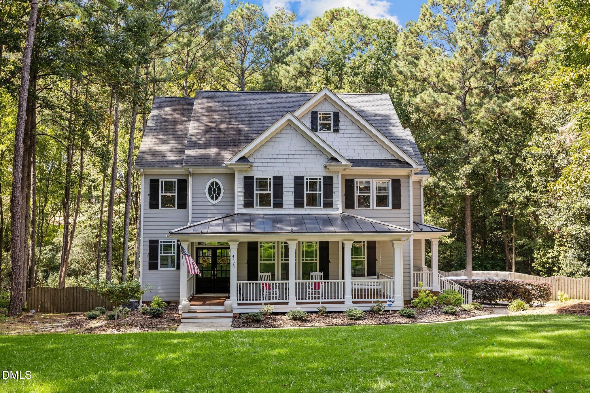 4620 Cresta Drive Raleigh, NC 27603 - Photo 2 of 39 front view of a house with a yard