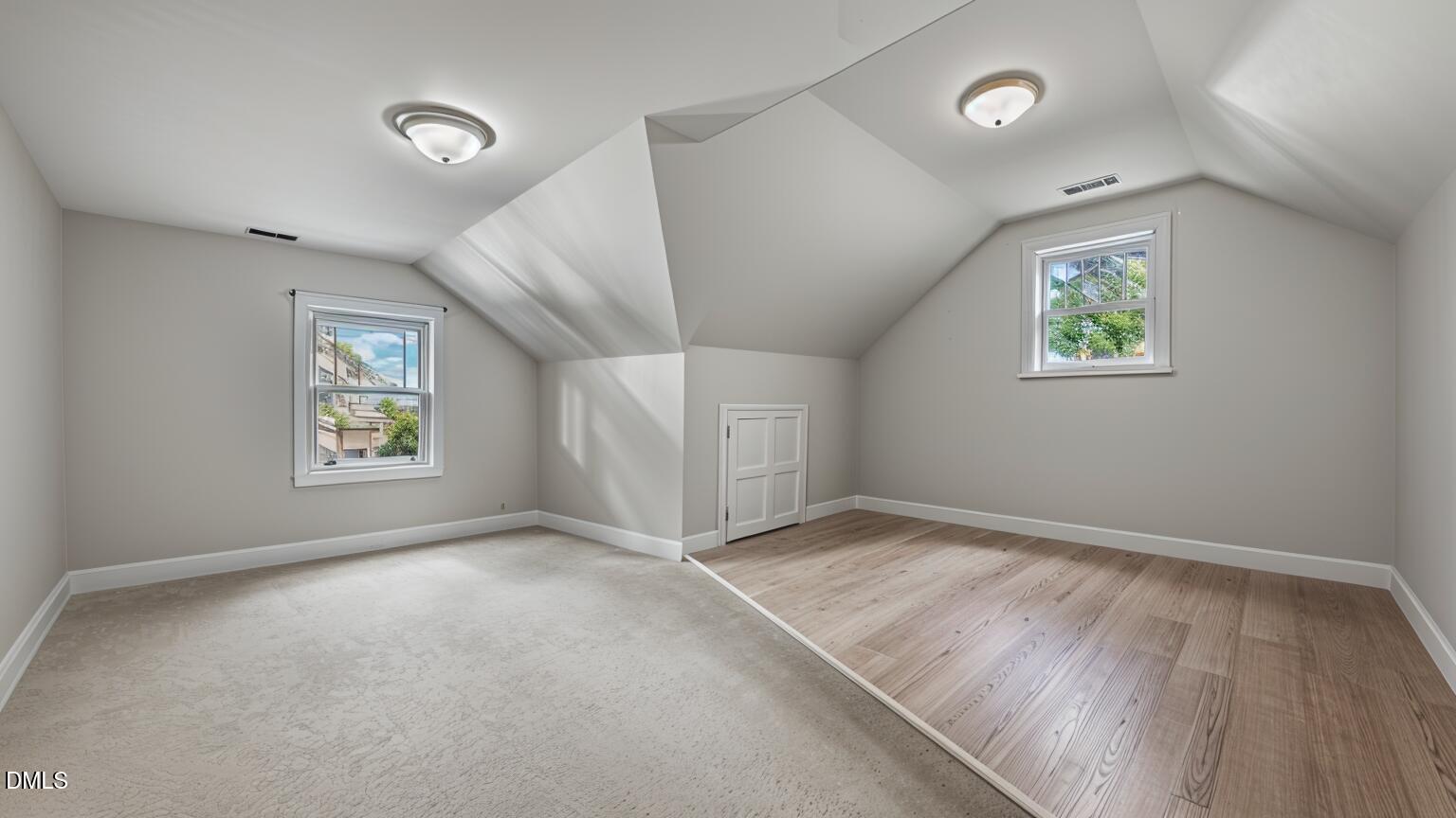 4620 Cresta Drive Raleigh, NC 27603 - Photo 24 of 39 an empty room with windows
