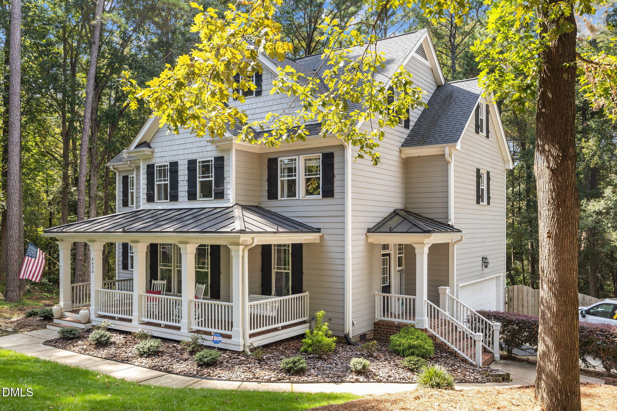 4620 Cresta Drive Raleigh, NC 27603 - Photo 3 of 39 a front view of a house with a yard and porch