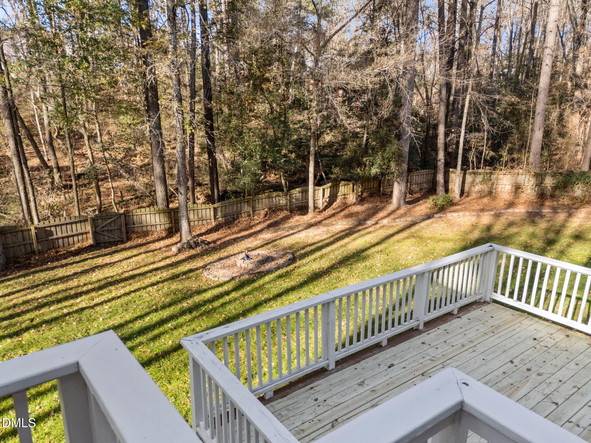 4620 Cresta Drive Raleigh, NC 27603 - Photo 34 of 39 a view of balcony with wooden floor and fence
