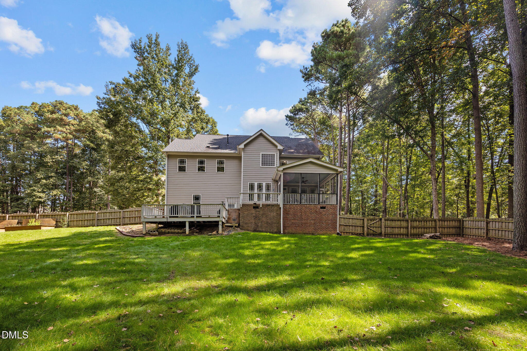 4620 Cresta Drive Raleigh, NC 27603 - Photo 36 of 39 a view of a house with a big yard and large trees