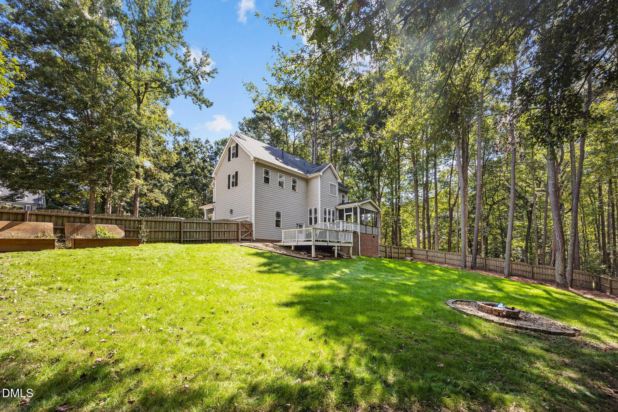 4620 Cresta Drive Raleigh, NC 27603 - Photo 37 of 39 a view of a house with a yard and sitting area
