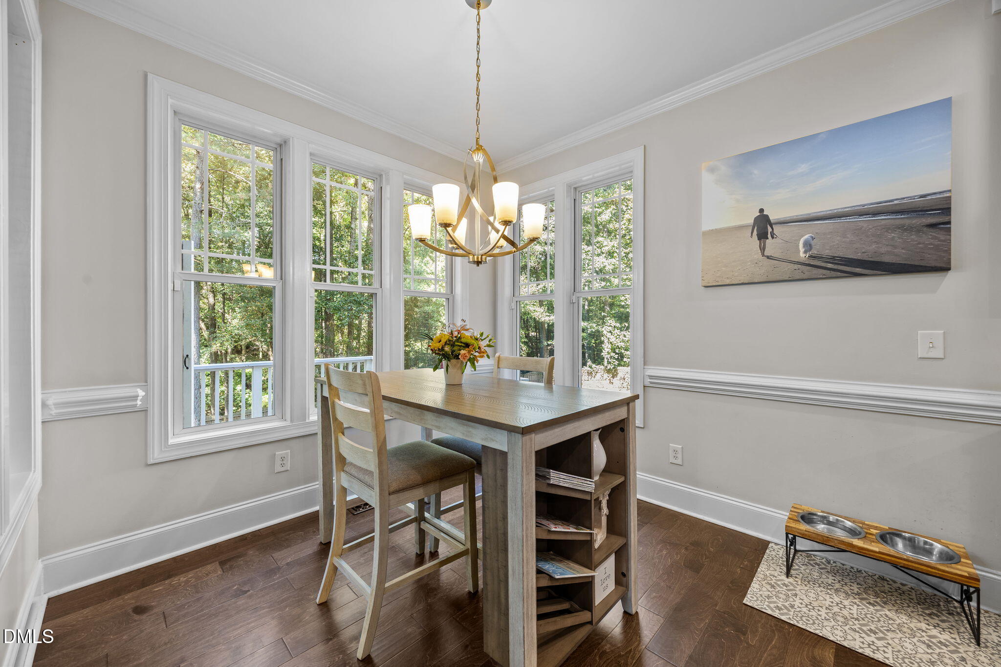 4620 Cresta Drive Raleigh, NC 27603 - Photo 10 of 39 a dining room with furniture window wooden floor