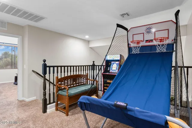a view of an entryway with a rug