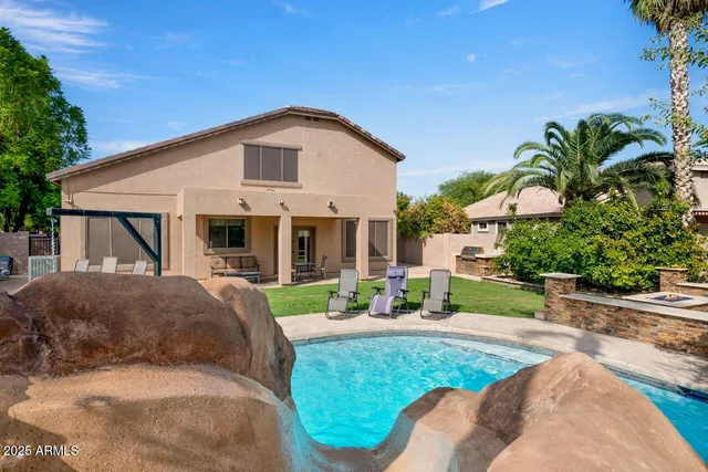 a backyard of a house with lots of green space