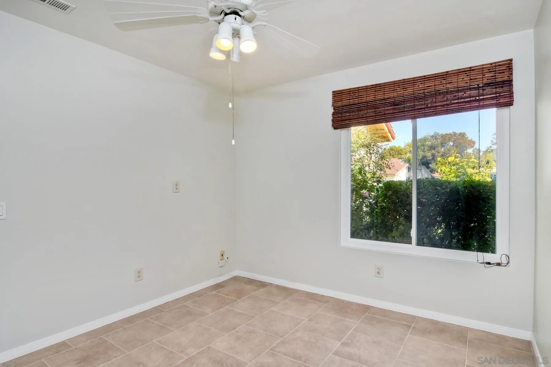 803 Caminito Azul Carlsbad, CA 92011 - Photo 16 of 41 an empty room with a window