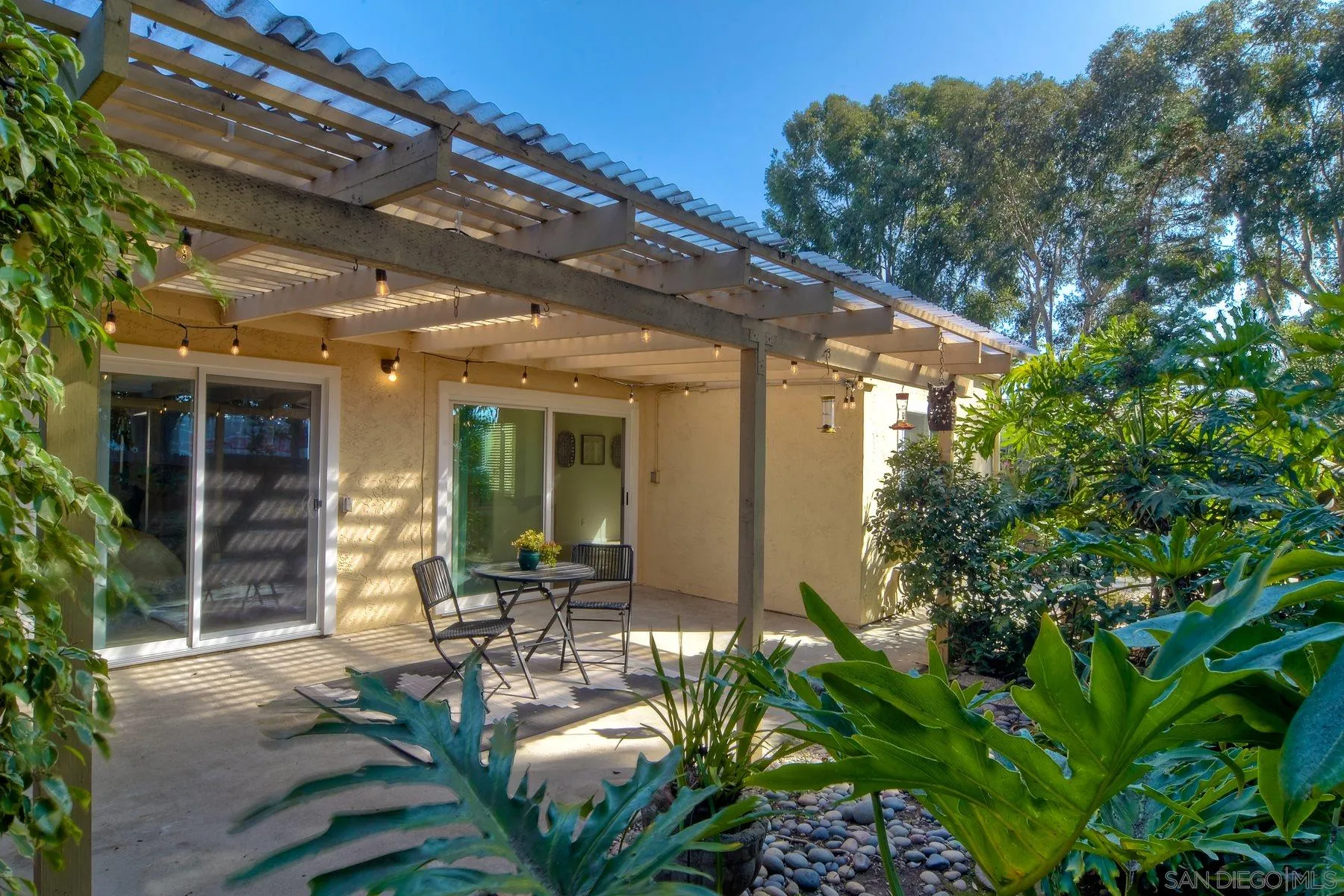 803 Caminito Azul Carlsbad, CA 92011 - Photo 36 of 41 a front view of a house with garden