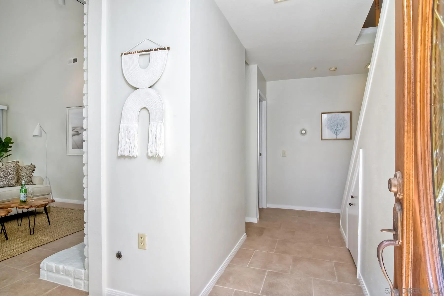803 Caminito Azul Carlsbad, CA 92011 - Photo 6 of 41 a view of a room with wooden floor and windows