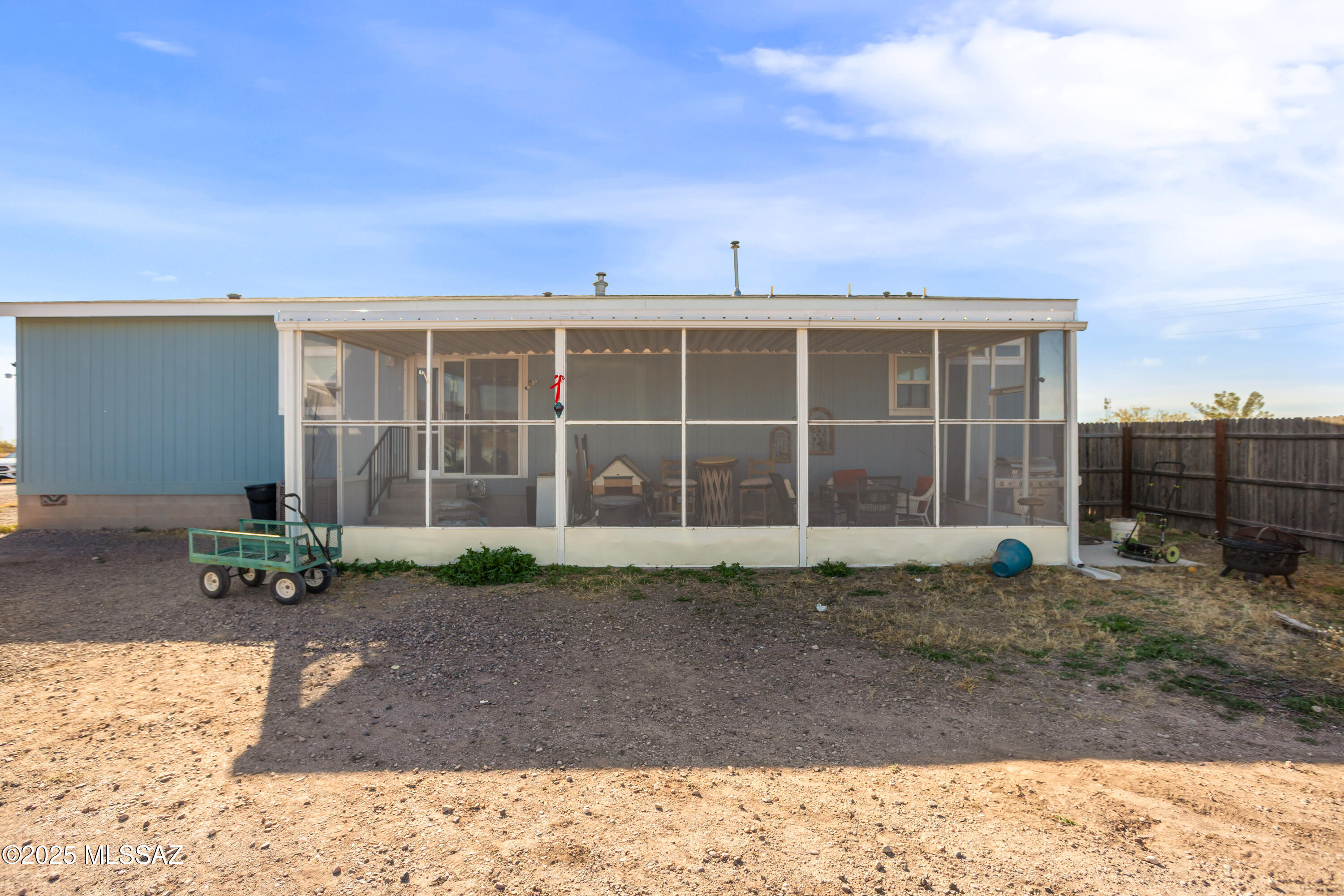 10187 North Mormon Road Elfrida, AZ 85610 - Photo 44 of 50 a view of a house with a yard