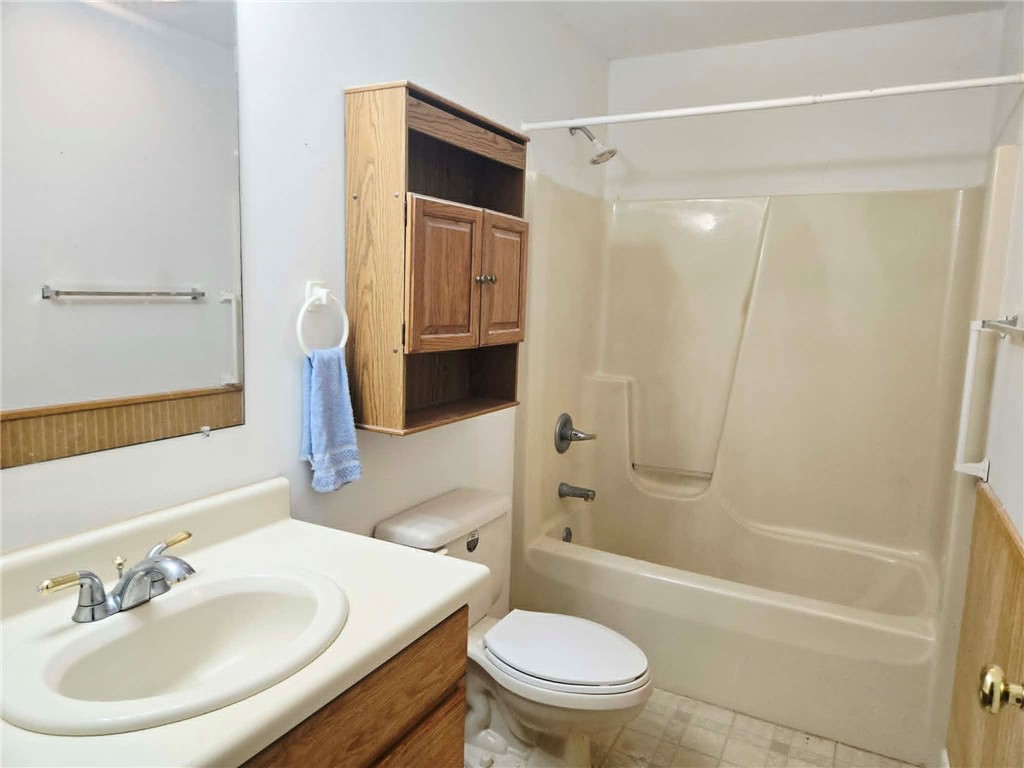 202 Keith Lane Seneca, SC 29678 - Photo 16 of 23 Functional full bathroom featuring a tub and shower combination with ample vanity space.