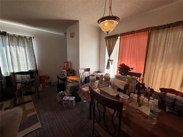 a bed room with furniture and a window