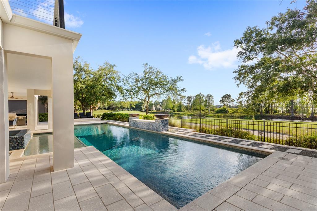 11255 Macaw Court Windermere, FL 34786 - Photo 45 of 49 a view of a swimming pool with a patio