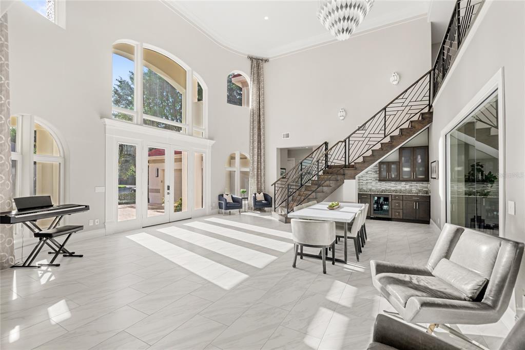 11255 Macaw Court Windermere, FL 34786 - Photo 7 of 49 a living room with furniture