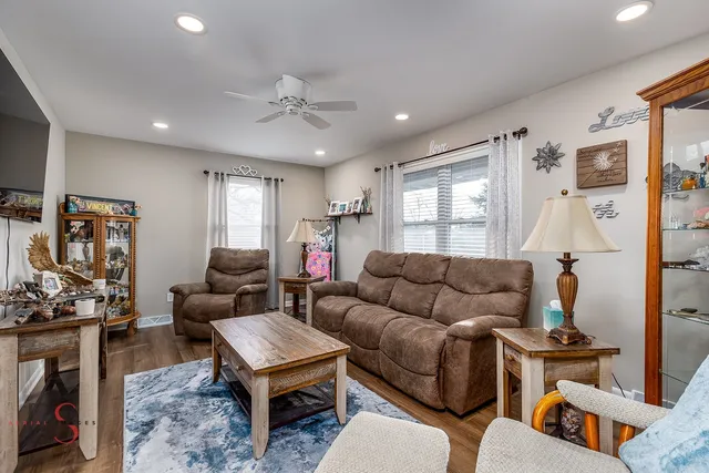 a living room with furniture and a window