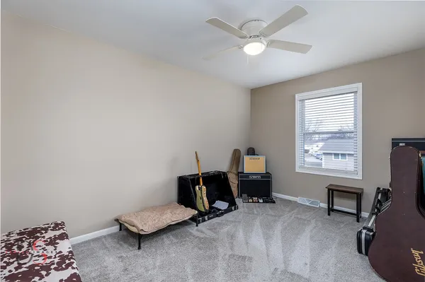 a room with furniture and a window