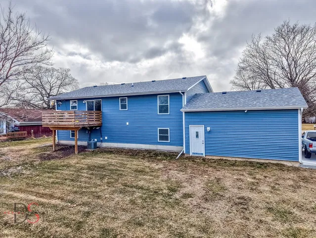 a house with trees in front of it