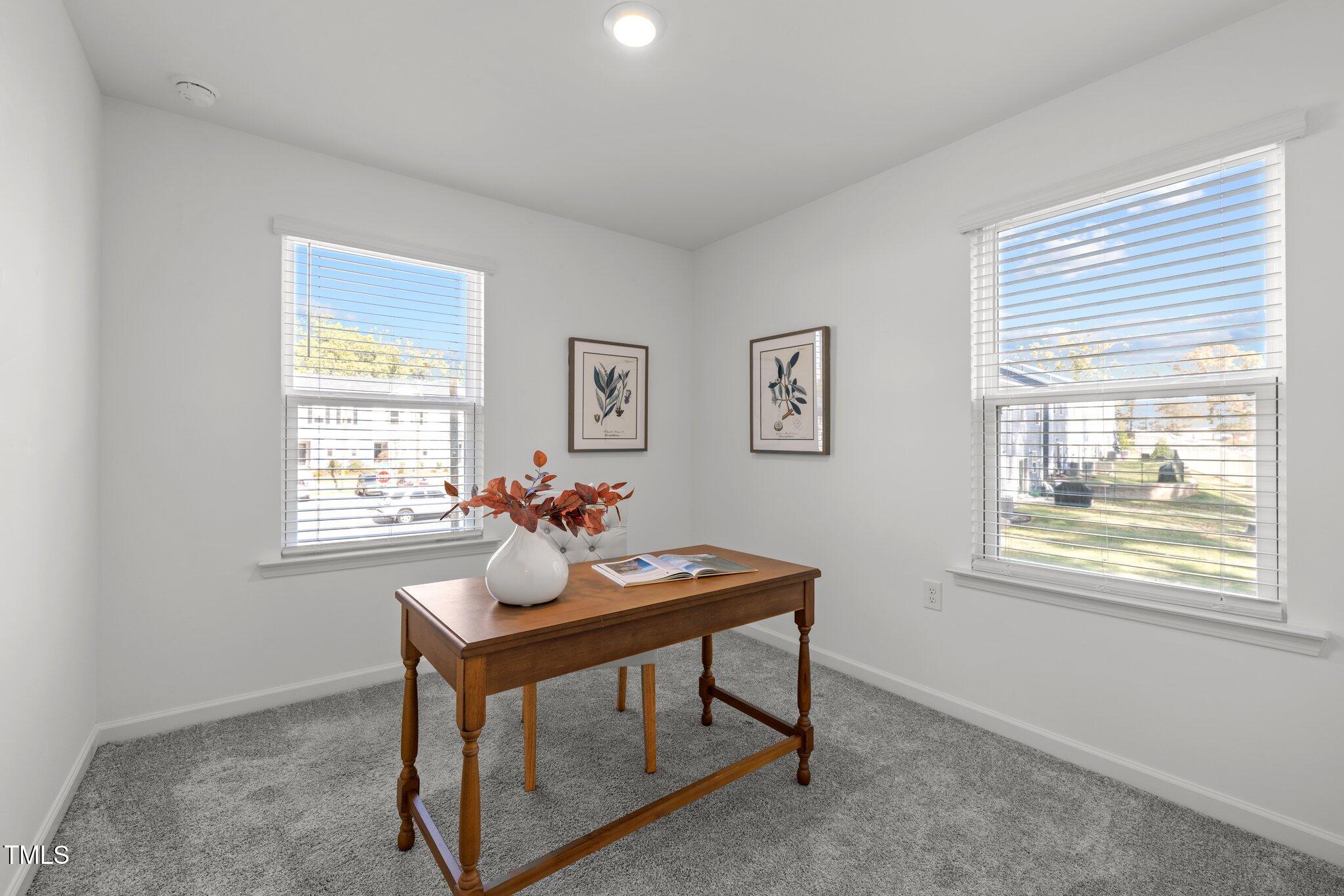 3120 Crater Loop Raleigh, NC 27610 - Photo 15 of 19 a living room with furniture and a window