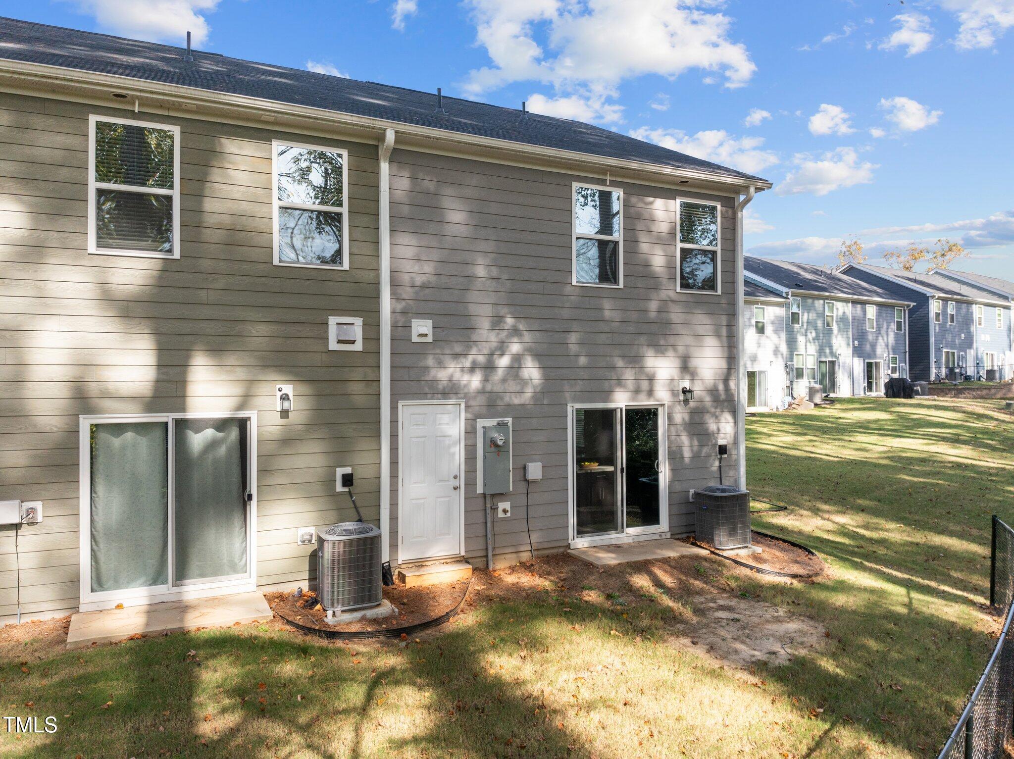 3120 Crater Loop Raleigh, NC 27610 - Photo 17 of 19 a view of a house with a patio