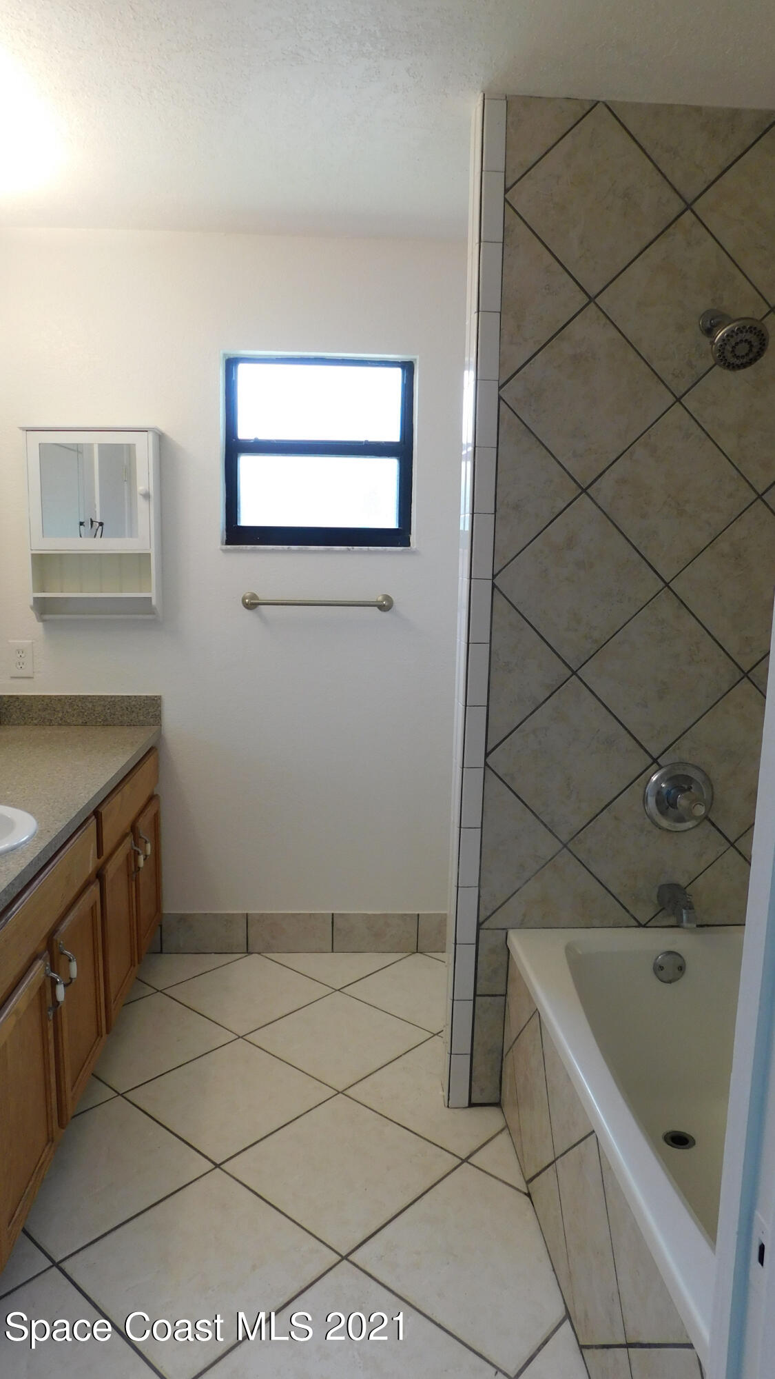 6054 Cardiff Avenue Cocoa, FL 32927 - Photo 13 of 20 Cardiff Master Bathroom 1 - 3