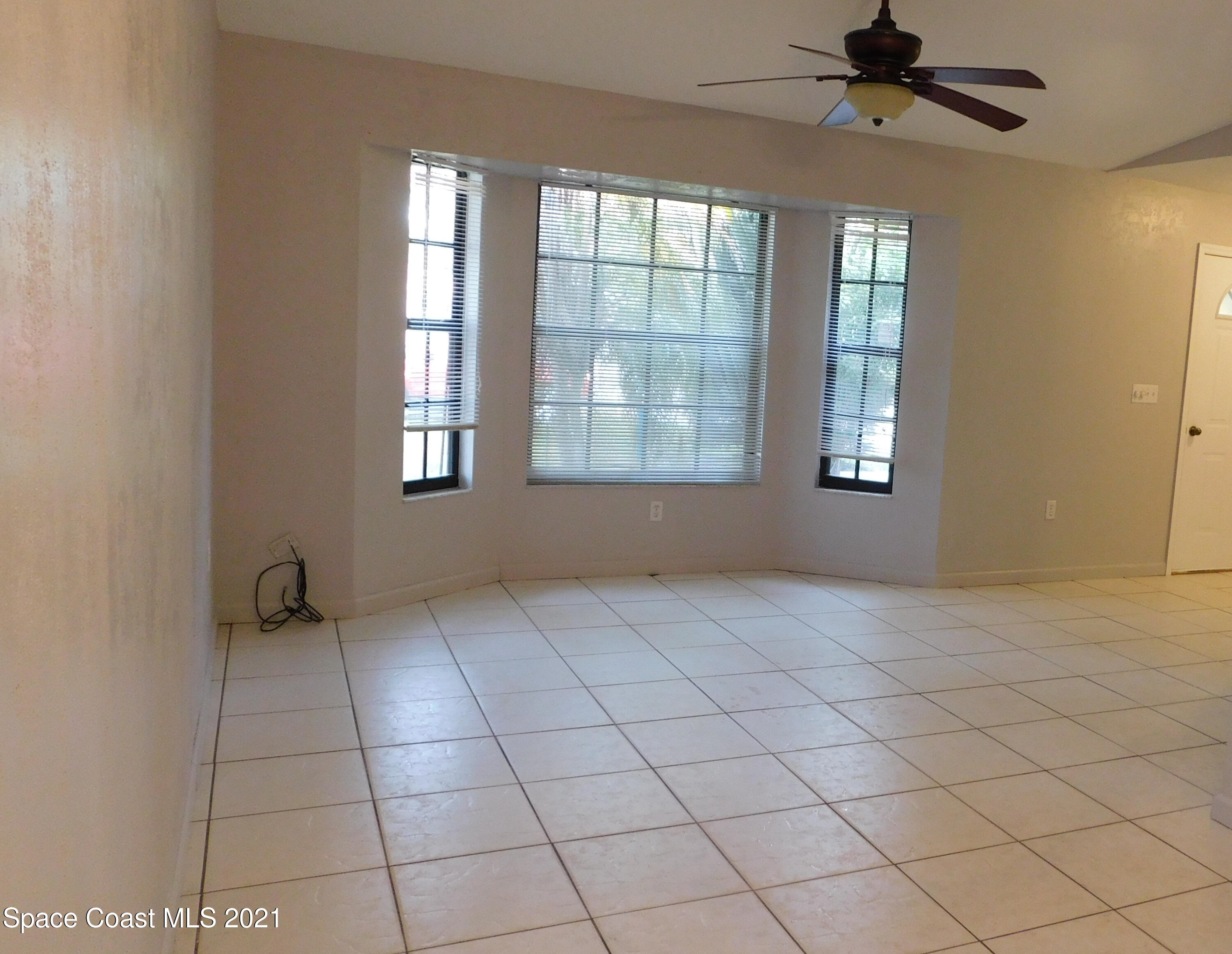 6054 Cardiff Avenue Cocoa, FL 32927 - Photo 5 of 20 Cardiff Dining-Living Rm