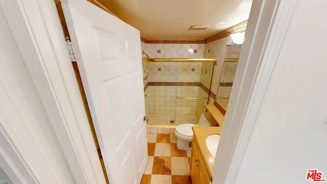 a bathroom with a tub and a shower